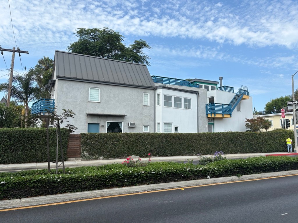 Multi-building residential property with metal roofing